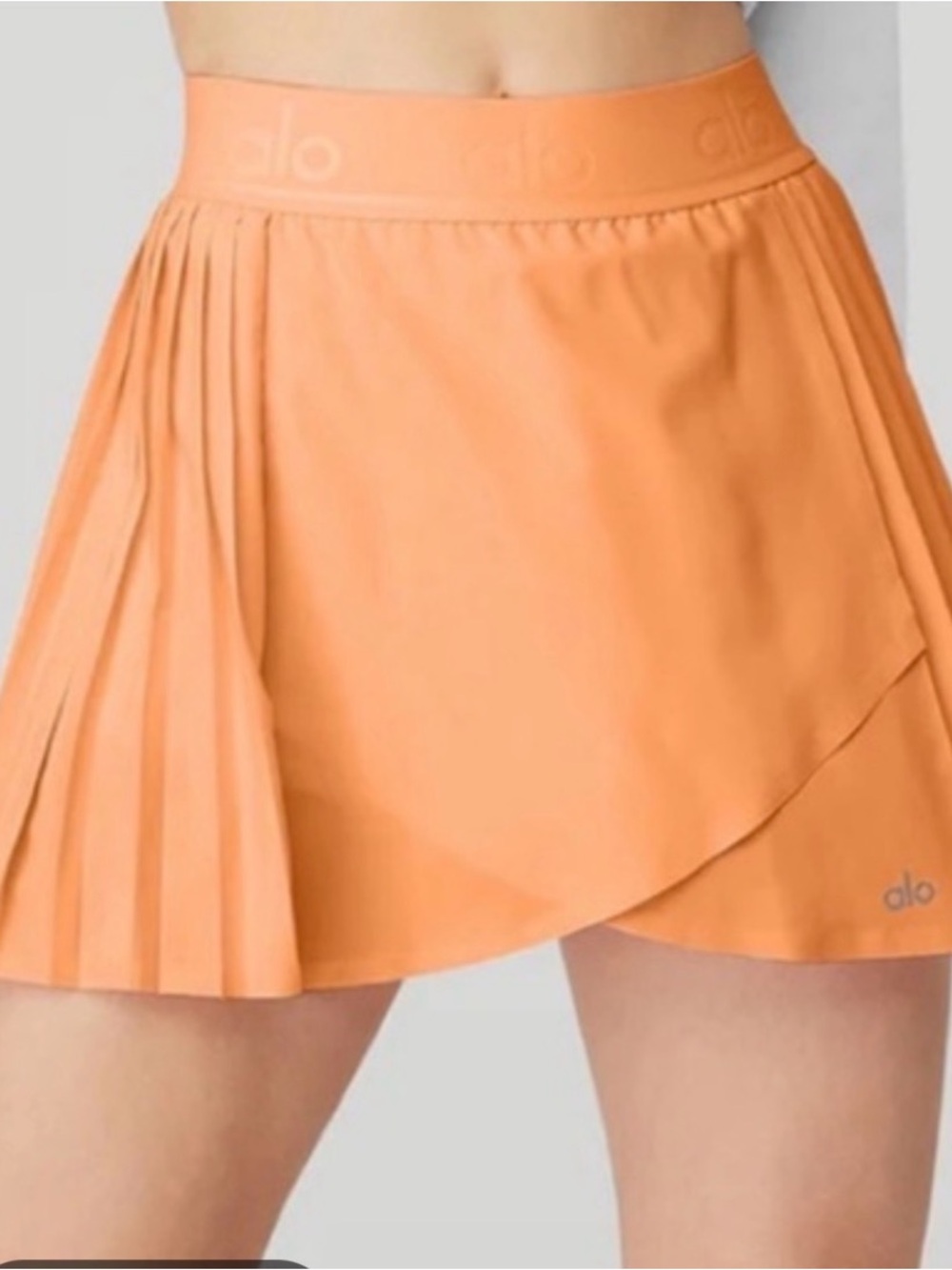 ALO Yoga Orange Pleated Wrap Mini Skirt